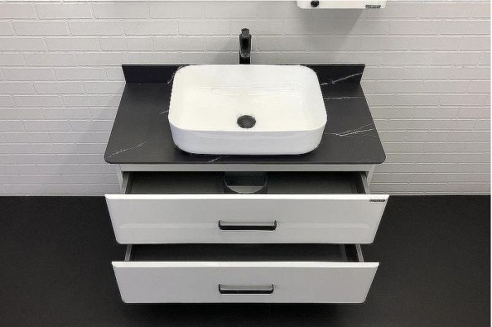 Тумба с раковиной Comforty Амстердам 95 00-00014001 подвесная Белая глянцевая Калакатта Блэк